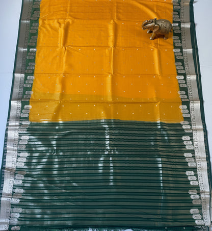 Yellow and Green Crepe Silk Saree